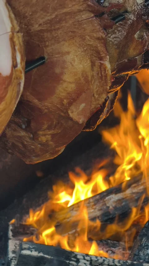 Vertical Meat Roasting Over Open Wood Fire Rustic BBQ Cooking 4K Stock-Footage 332162958