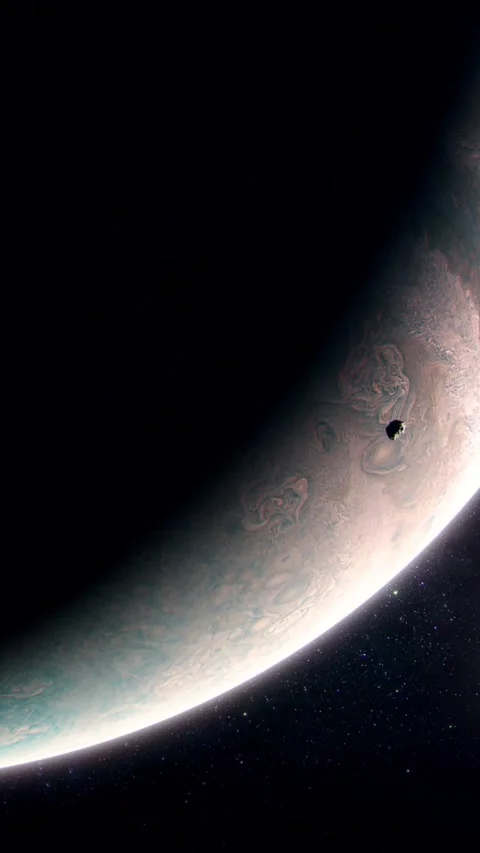 Vertical Medium Shot of the Gas Giant Jupiter with an Asteroid Approaching Stock Footage 291022681