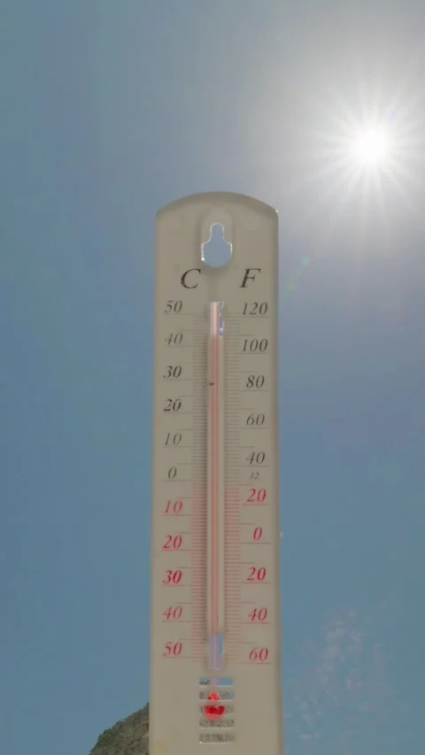 Vertical  mercury on the thermometer keeps rising and hits the maximum limit. Stock Footage 336037072