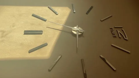 Vertical: metal clock with graduations embedded in the wall, sun highlight Video stock 233345051