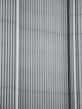 Vertical metal louver facade pattern Stock Photos
