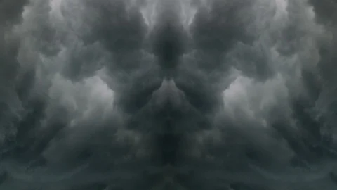 Vertical mirror image of heavy rain clouds forming outwards Stock Footage 92715164