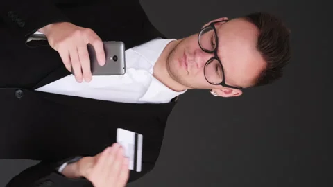 Vertical mobile banking man phone app credit card Stock Footage 264162701