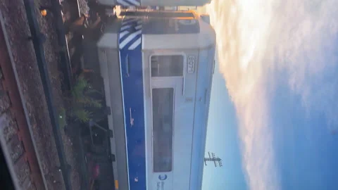 Vertical mobile phone video orientation. Looking out of the train window Stock Footage 222016534