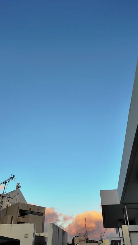 Vertical Morning Sky with Orange Clouds over Naha City, Okinawa Stock Footage 298099654