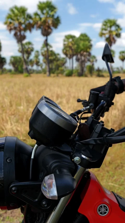 Vertical Motorcycle Key Turn And Engine Rev Close-Up In Cambodia Stock Footage 327612012