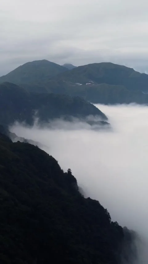 Vertical Mountain Cloud Sea Aerial Drone Nature Scenery Motion Stock Footage 327678974