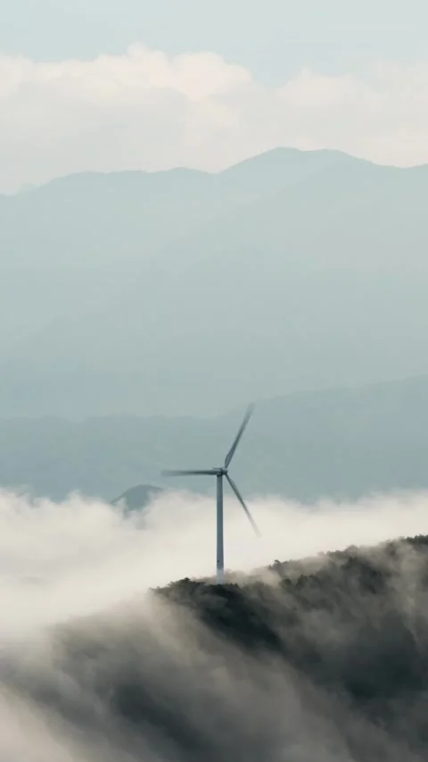 Vertical Mountain Cloud Sea Windmill Timelapse with Flowing Clouds Peak Stock Footage 327599756