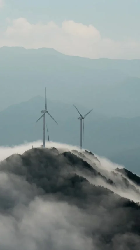 Vertical Mountain Cloud Sea Windmill Timelapse with Flowing Clouds Peak Stock Footage 327599774
