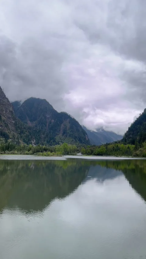 Vertical Mountain Lake Reflection in Bipenggou Scenic Area, Sichuan, China Stock Footage 338332428