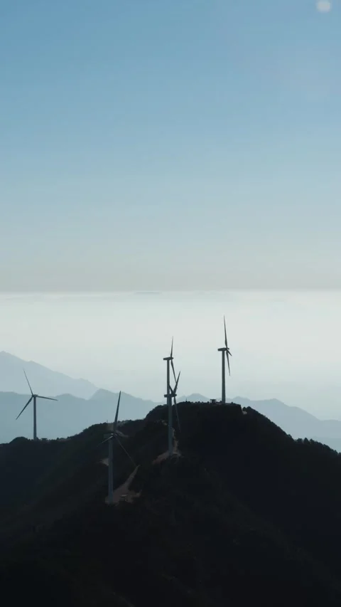 Vertical Mountain Peak Clouds Timelapse with Sunset Glow and Flowing Sky Stock Footage 327599861