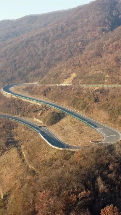 Vertical Mountain Peak Road Aerial View Drone Motion Scenery Stock Footage 327677972