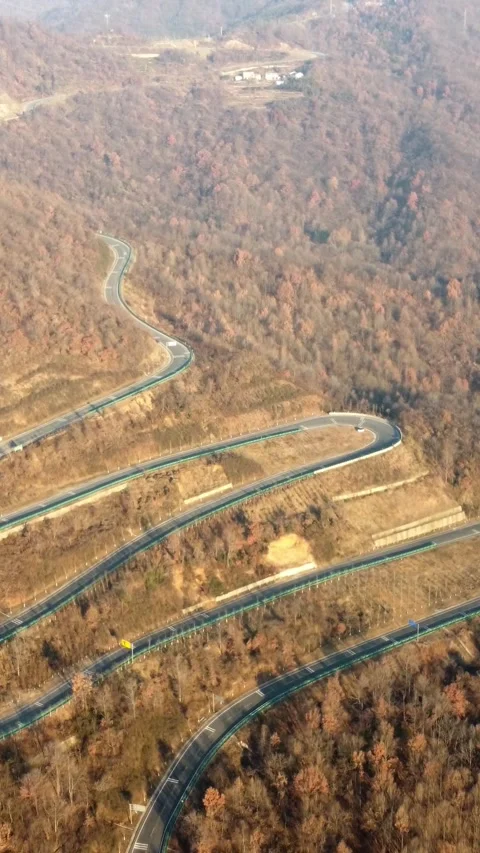 Vertical Mountain Peak Road Aerial View Drone Motion Scenery Stock Footage 327678073