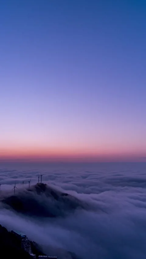 Vertical Mountain Peak Sea of Clouds Timelapse Majestic Nature Stock Footage 327668411
