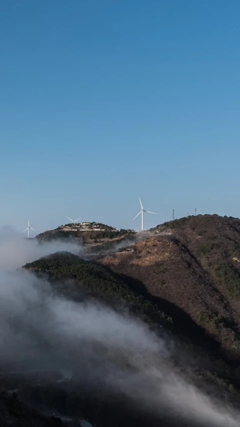 Vertical Mountain Peak Sea of Clouds Timelapse Majestic Nature Stock Footage 327668553