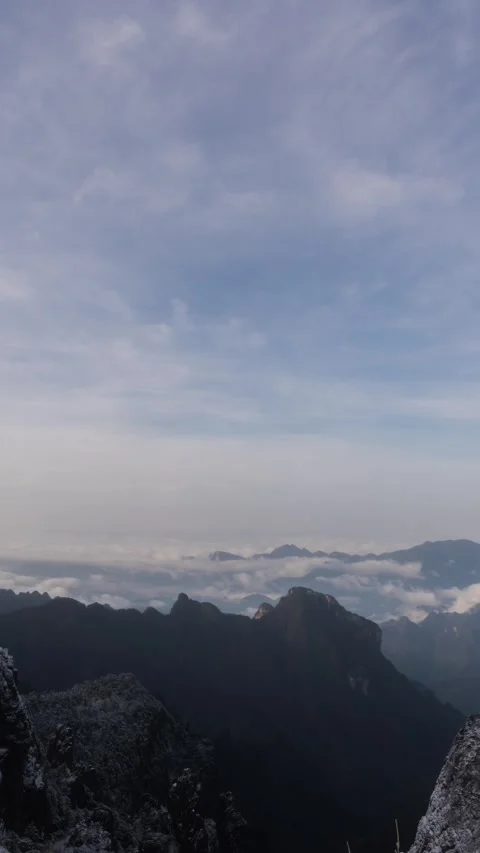 Vertical Mountain Peak Sea of Clouds Flow Nature Motion Timelapse Stock Footage 327670915