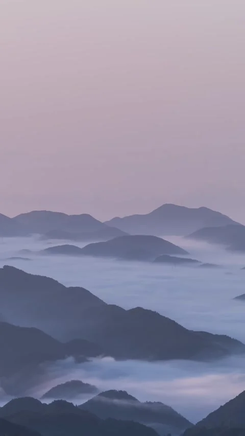 Vertical Mountain Peak Sea of Clouds Mist Flow Motion Timelapse Stock Footage 327676170