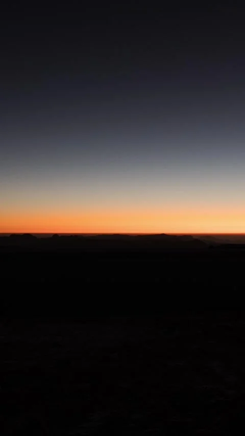 Vertical Mountain Peak Sunrise Light and Shadow Motion Timelapse Stock Footage 327670828