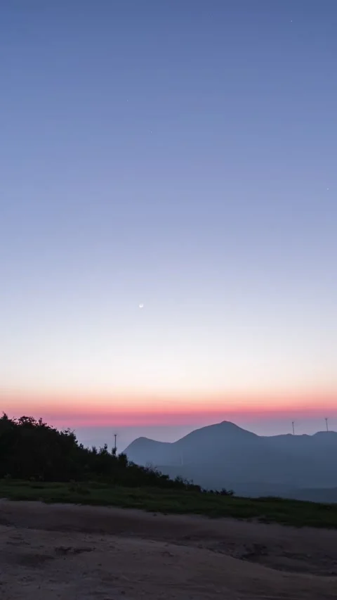 Vertical Mountain Peak Sunrise Timelapse with Morning Glow and Cloud Sea Vista Stock Footage 327479226