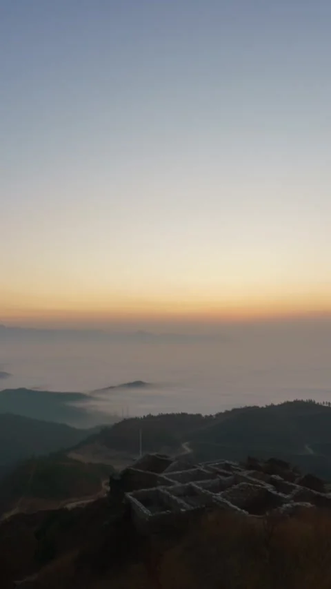 Vertical Mountain Peak Sunrise Timelapse with Golden Sun Rays Stock Footage 327668836