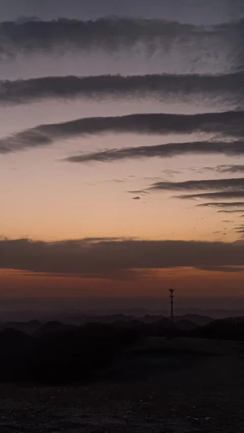 Vertical Mountain Peak Sunrise Timelapse with Golden Sun Rays Stock Footage 327669245