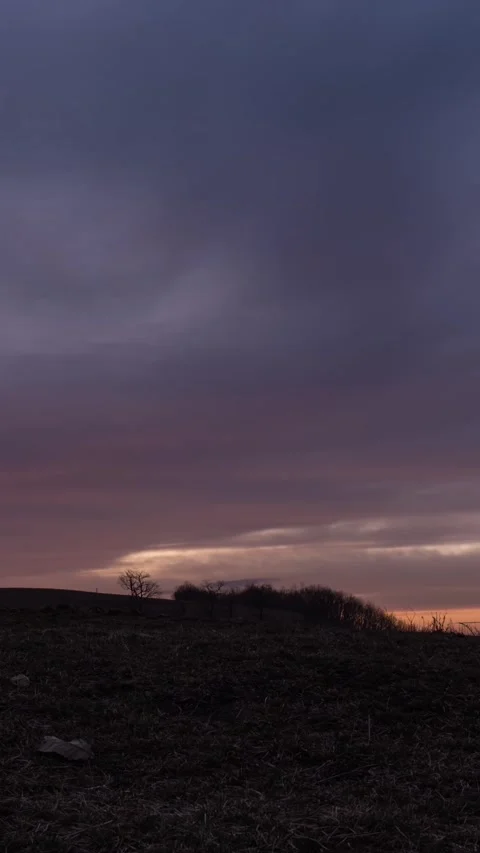 Vertical Mountain Peak Sunset Light and Shadow Motion Timelapse Stock Footage 327669343