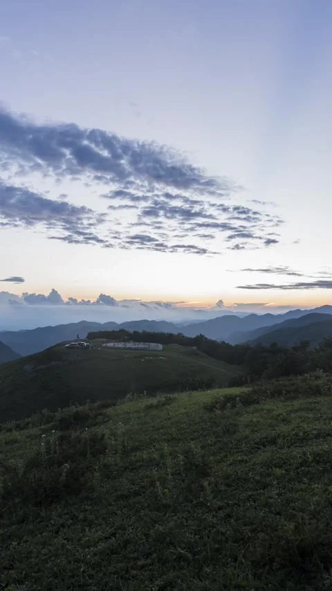 Vertical Mountain Peak Sunset Light and Shadow Motion Timelapse Stock Footage 327669344