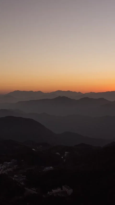 Vertical Mountain Top Sunrise Timelapse with Golden Sun and Rolling Clouds Vista Stock Footage 327479998