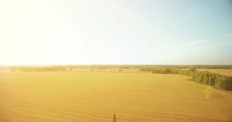 Vertical movement flight near high voltage electricity tower and power lines at Stock Footage 152983012