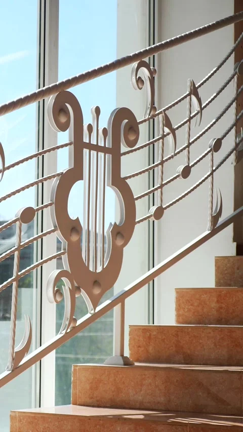 Vertical, Musical notes cascading down a staircase. Staircase adorned with whims Stock Footage 296106730