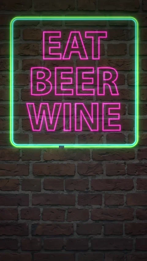 Vertical Neon Eat Beer Wine Sign Flickering on Brick Wall Stock Footage 339838441