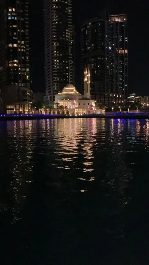 Vertical night footage of Al Rahim Mosque in Dubai Marina Stock Footage 256709082