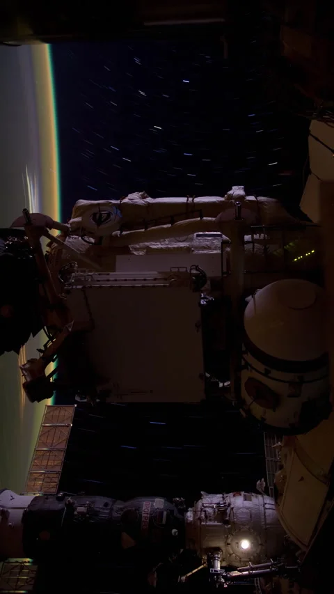Vertical Night ISS Solar Panel Rotation City Lights Stars. Stock Footage 330397476