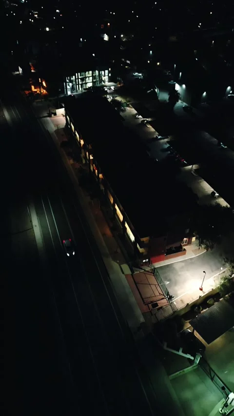 VERTICAL NIGHT TIME CAR DRIVE BY Stock Footage 248581833