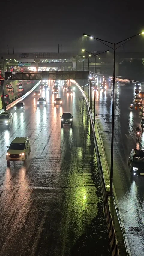 Vertical Night View of Highway Traffic in Rain Stock-Footage 341939739