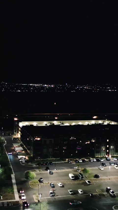 VERTICAL NIGHT VIEW PARKING LOT Stock Footage 248578955