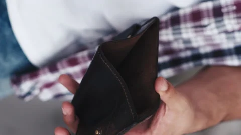 Vertical no money poverty problem man empty wallet Stock Footage 240075747