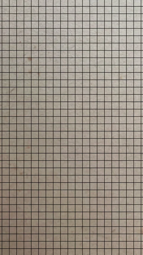 Vertical Notebook Loop Graph Paper Grid Developing on Sketch Texture Stock Footage 336576509