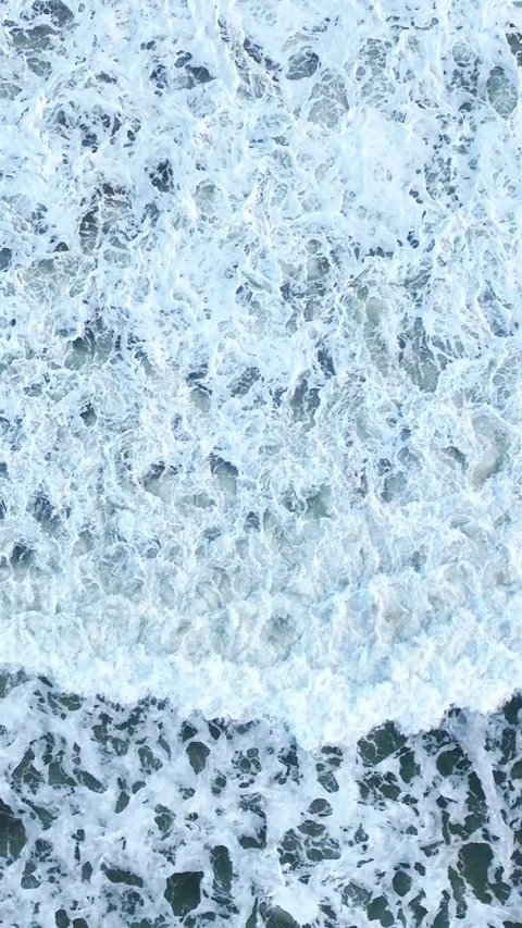 Vertical ocean foam pattern from above Stock Footage 335432827