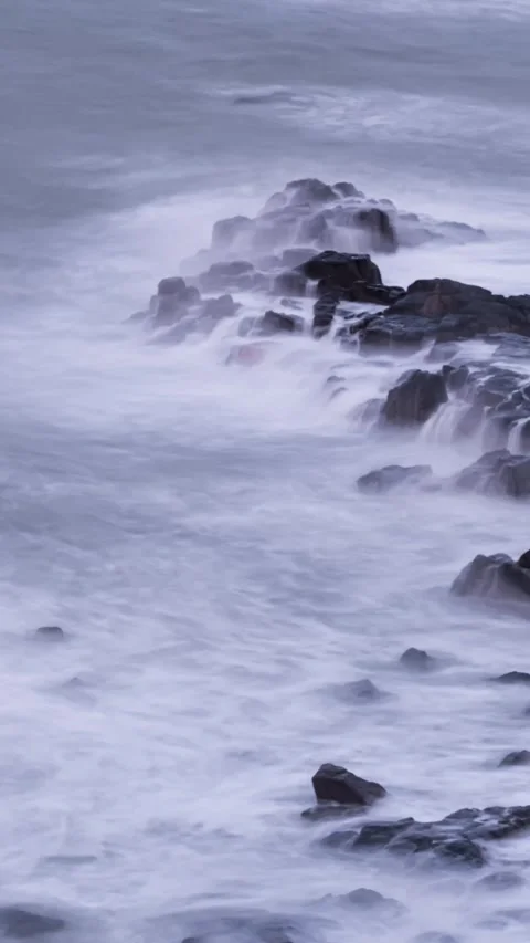 Vertical Ocean Waves Crashing on Rocks Motion Shoreline Timelapse Stock Footage 327670234