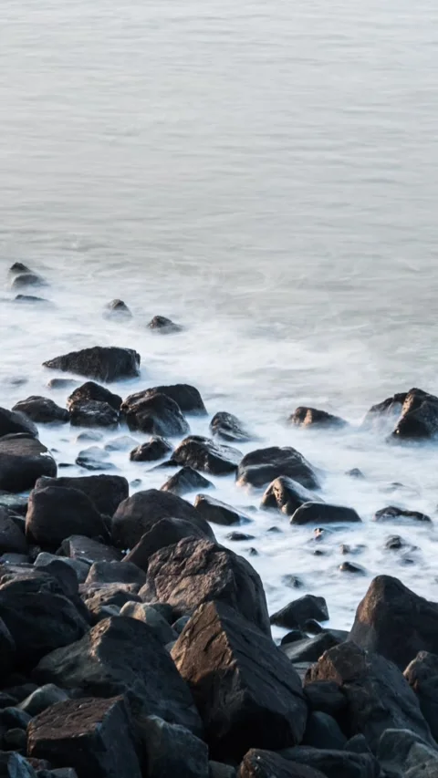 Vertical Ocean Waves Crashing on Rocks Motion Shoreline Timelapse Stock Footage 327670235