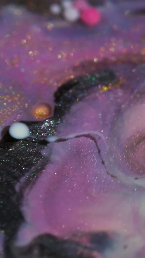 Vertical oil flow bubble liquid glitter paint mix Stock Footage 333874402