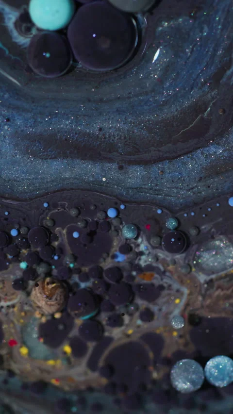 Vertical oil liquid ink bubbles water glitter Stock Footage 334092861
