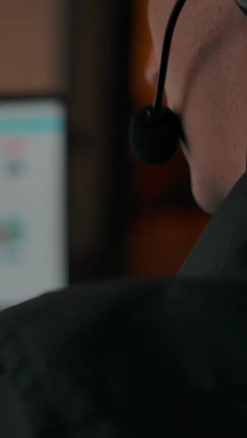 Vertical of Online call center working from home interior. Man behind laptop Stock Footage 276915883