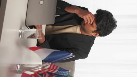 Vertical online work exhausted man translation Stock Footage 219747659
