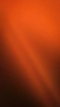 This vertical orange brown and black grainy abstract background features a sm Stock Illustration