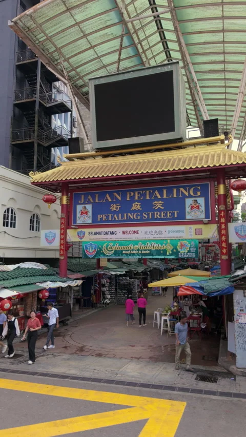 Vertical orbit shot of the main gate of Chinatown in Kuala Lumpur Stock Footage 279807381