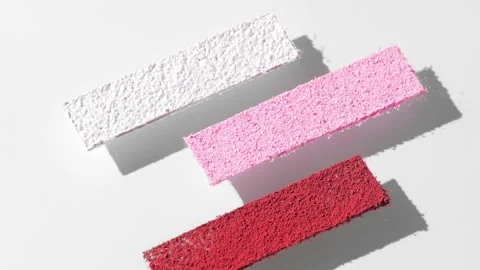 Vertical orbit view of colorful powder stripes for blush Stock Footage 341839910