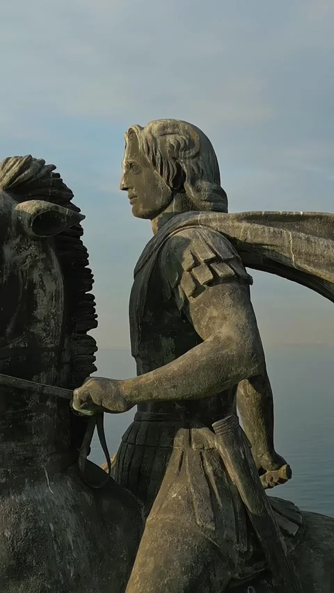 Vertical orbiting descend Alexander the Great statue sword 4k Stock-Footage 333815348