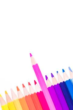 Vertical orientation of coloured pencils on white, with space for text Stock Photos
